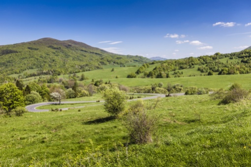 Mountains scenery. Panorama of grassland and forest in Bieszczady National Park. Carpathians landscape, Poland.